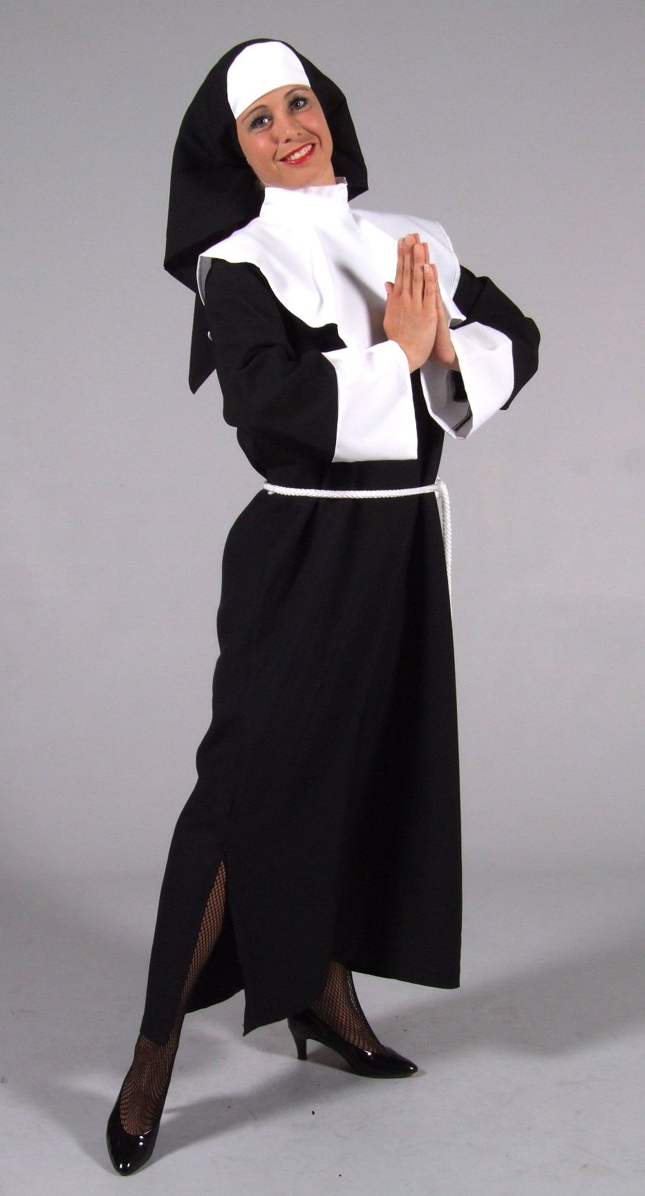 Sexy Nun wearing Black Fishnet Pantyhose and Black Long Dress